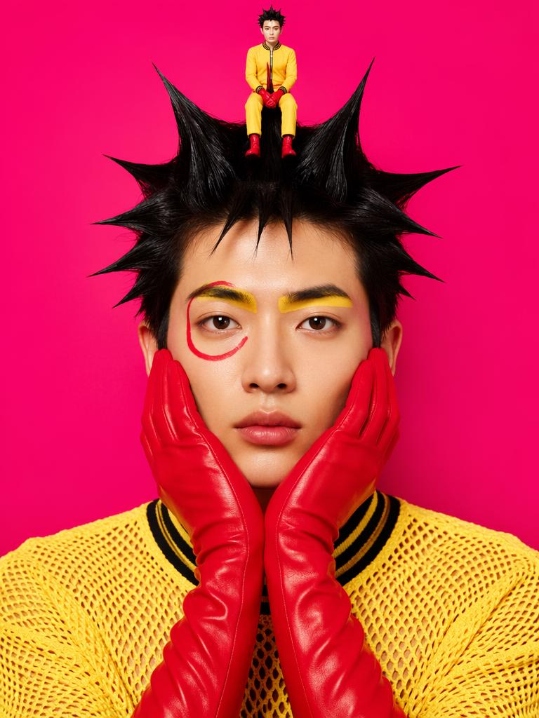 Surreal juxtaposition of a miniature doll-like figure in yellow and red apparel perched o...