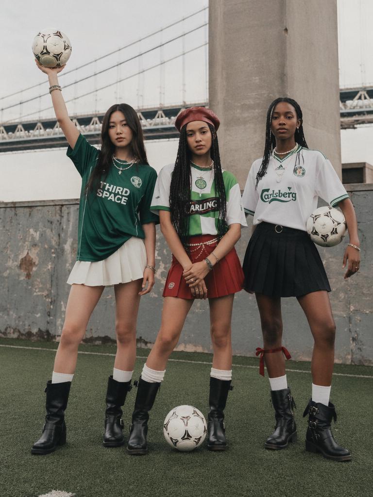 A trio of young women styled in 'blokette' aesthetic, blending soccer jerseys with femini...